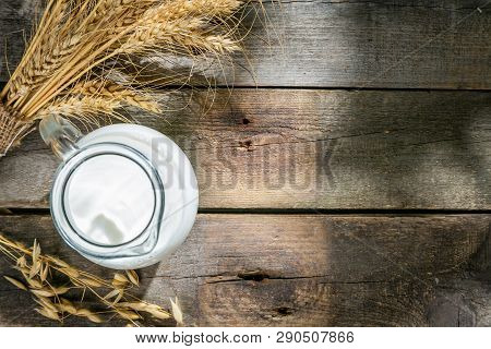 Shavout Concept - Grains, Milk And Cheese On Wood Background, Top View