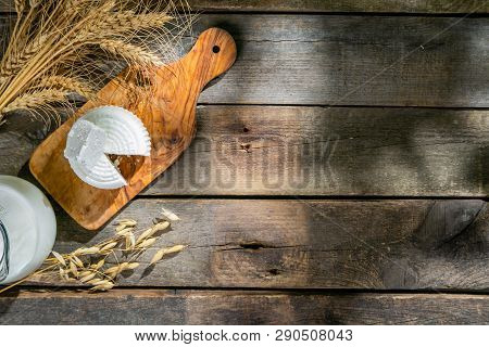 Shavout Concept - Grains, Milk And Cheese On Wood Background, Top View