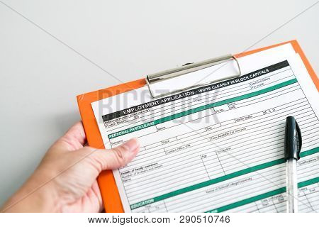 Seeking Job Concept, Filling Up The Information In An Employment Application Form
