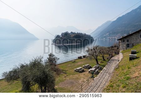 Island Comacina In The Fog, Surrounded By Lake Como, It Is Located In Ossuccio Of The Municipality O