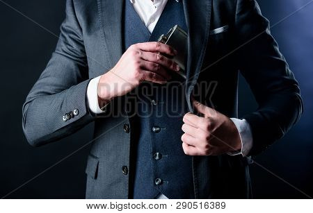 Brandy Drink. Man Drink Alcohol. Male Put Brandy Flask In Pocket. Bachelor And Single. Male Has Bad 