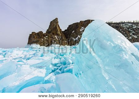 Cape Khoboy Rock On Olkhon Island, Lake Baikal, Ice Hummocks In Winter, Russia, Siberia
