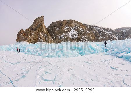 Cape Khoboy Rock On Olkhon Island, Lake Baikal, Ice Hummocks In Winter, Russia, Siberia