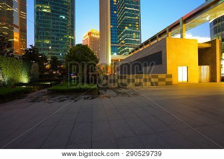 Empty Marble Road Floor Surface With Modern City Buildings Of Night Scene In Shanghai