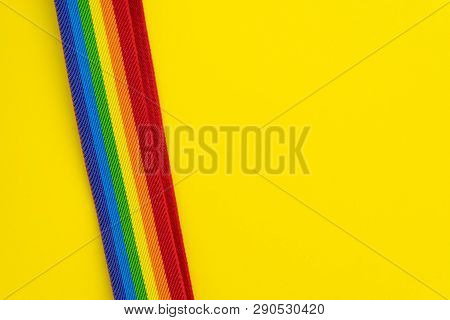 Lgbt Rainbow Headband On Solid Yellow Background With Copy Space Using As Celebrate Of Homosexual, L