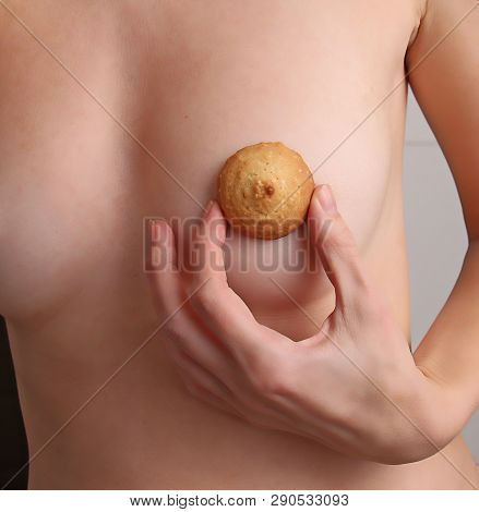 Female Breast And Female Nipple. Unusual Humor, Illusion, Surrealism. Female Nude Or Naked Body. You