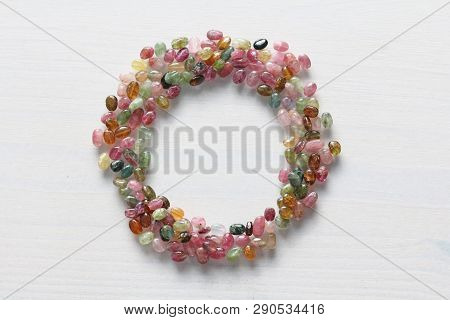 Natural Stone Tourmaline. Beautiful Card For Congratulations. A Circle Of Natural Stones. Blue, Gree