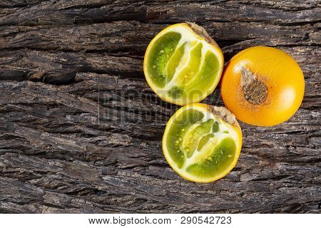 Fruit Of Lulo On Tree Bark (solanum Quitoense)