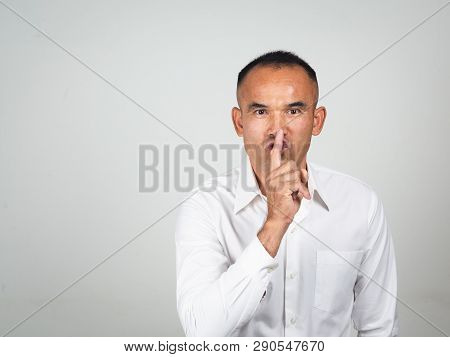 The Man Making Finger On Lips Silence Gesture, Pst, Shh,