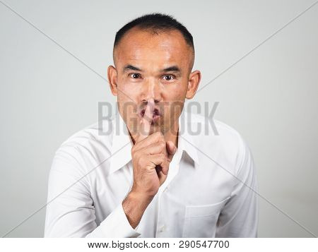 The Man Making Finger On Lips Silence Gesture, Pst, Shh,
