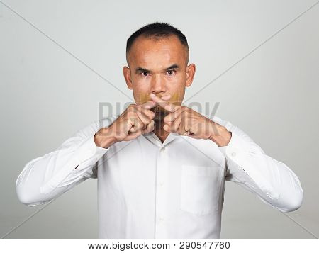 The Man Making Finger On Lips Silence Gesture, Pst, Shh,