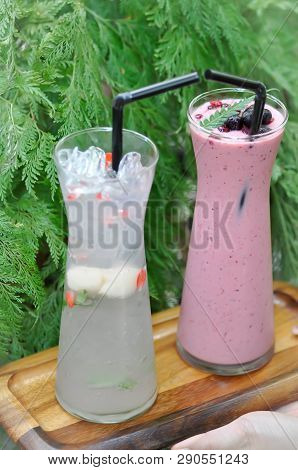 Serving Strawberry Yogurt Smoothie And Itlian Soda Or Lemon Juice
