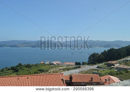 Raxo Bay With The Mussel Hatcheries In It. Nature, Architecture, History. August 19, 2014. Raxo, Pon