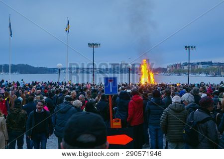 Stockholm, Sweden - Apr 30, 2018: Celebration Of Walpurgis Night, People Gathering On The Street Wit