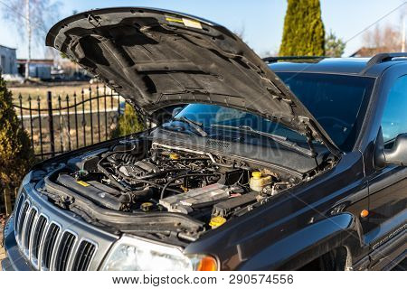Torun, Poland - February 16, 2019. The Engine Compartment Of The Jeep Grand Cherokee Wj Produced In 