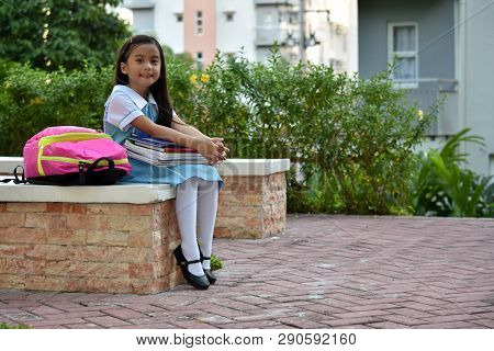 Wearing Uniform With Books