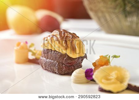 Baked Deer Fillet With Jus Sauce And Root Vegetables