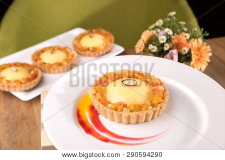Homemade Exotic Tart - Passion Fruit Ganache, Lime Curd, Exotic Marmalade, Coconut Biscuits Served I