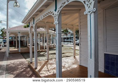 MARIGOT, SINT  MAARTEN - JULY 31, 2015: Famous fish market area buildings in Marigot.   