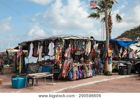 MARIGOT, SINT MAARTEN - JULY 31, 2015: Tent with gifts and souvenirs for tourist on Fish Market area in Marigot, seen in Marigot.