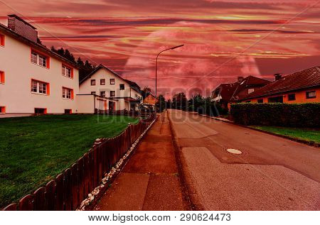 A Village Street With Futuristic Interplanetary Sky.