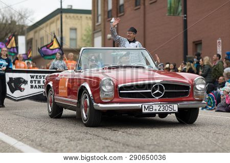 Holland, Michigan, Usa - May 12, 2018 Red Classic Mercedes Benz Drives Down The Road At The Muziek P