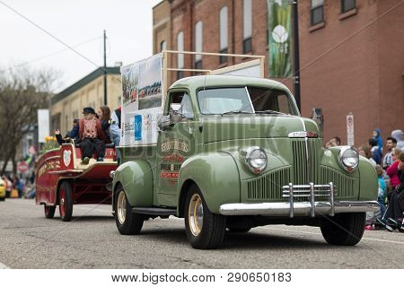 Holland, Michigan, Usa - May 12, 2018 A Classic Green Studebaker Truck With A Sign That Says Tervoor