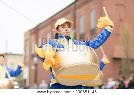 Holland, Michigan, Usa - May 12, 2018 Chinese Drummers Promoting Falun Dafa Performing At The Muziek