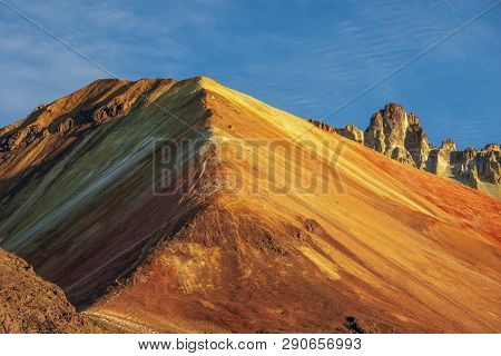 Bright Red And Yellow Colors At The Crater Of Famous Tunupa Volcano In Bolivia