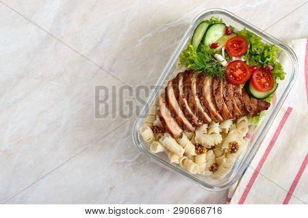 Lunch Box: Rotini With Baked Chicken Breast And Salad. Top View, Flat Lay. Delicious Healthy Lunch. 