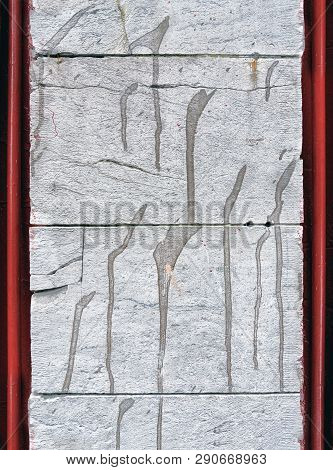 Concrete Slabs With Red Pipes At The Edges. Close View. Background And Texture.