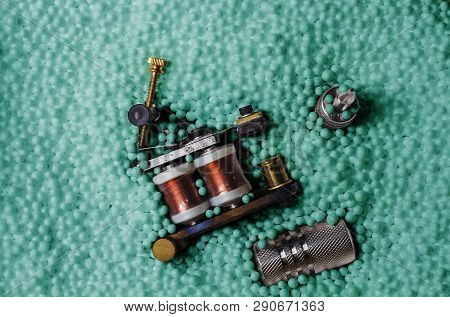 Accessories To Tattoo, In Green Background And Unicel