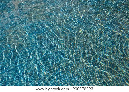 The Texture Of The Water In The Summer Pool Close-up
