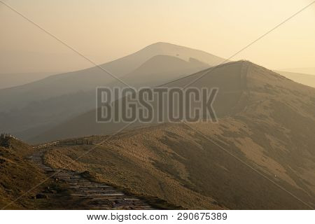 Beautiful Winter Sunrise Landscape Image Of The Great Ridge In The Peak District In England With Mis