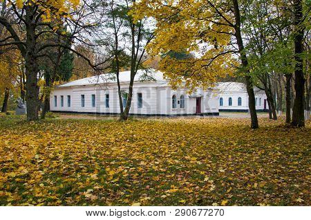 Lyzohub Manor On The Background Of The Autumn Park  In Sedniv. Chernihiv Region. Ukraine. Horizontal