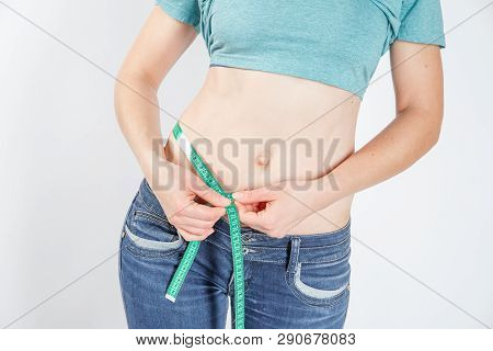 Woman Body After Weight Loss. Cropped Close Up Photo Of Fatless Slender Body Parts And Proportions W