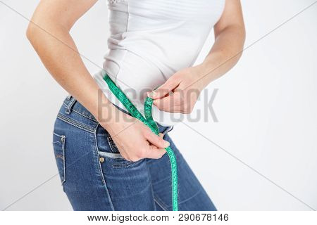 Woman Body After Weight Loss. Cropped Close Up Photo Of Fatless Slender Body Parts And Proportions W