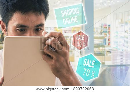 Man Holding Tablet On Blurred City Background For E-shopping 
Marketing Digital, Consumer Purchase S