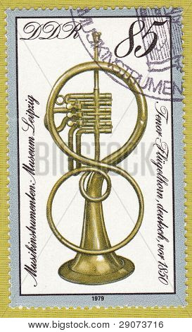 GDR - CIRCA 1979: A stamp printed in East Germany showing the image of a musical instrument 