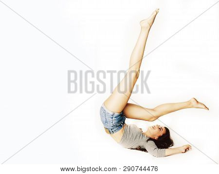 Young Pretty Brunette Woman Head Over Heels On White Isolated