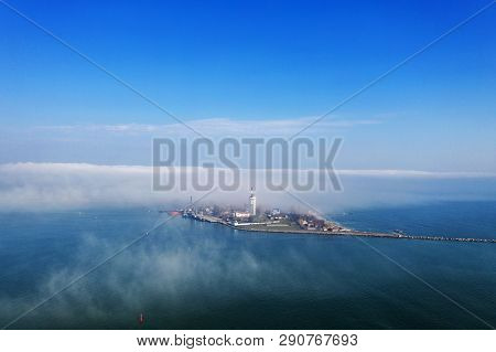 Aerial View Of Panoramic Seaport Warehouse And Container Ship, Crane Vessel Working For Delivery Of