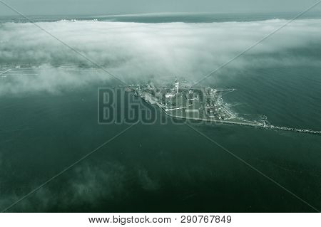 Aerial View Of Panoramic Seaport Warehouse And Container Ship, Crane Vessel Working For Delivery Of 