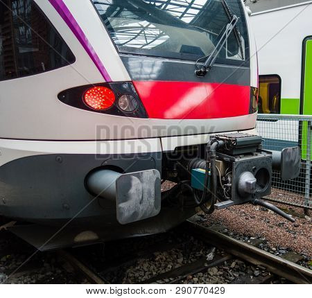 Commuter Train Locomotive At The Station With Connector For Connecting Wagons On A Normal Day