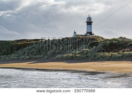 This Is A Picture Of Stroove Beach And Lighthouse On The Inishowen Penisula, Donegal Ireland