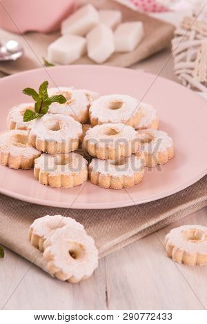 Canestrelli Biscuits With Cappuccino On Wooden Table.