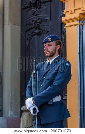 Stockholm, Sweden - June 2016: Royal Swedish Guardsman With Beard In A Modern Uniform With A Gun On 