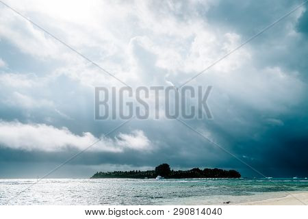 Maldives Background. Sunset Over The Tropical Sea And Coral Beach With Colorful Clouds In The Sky. B