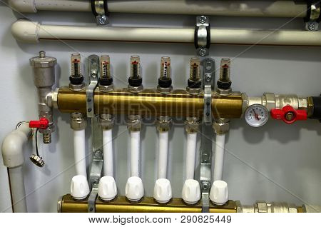 Heating Pipes System With Valves And Counter.  Modern Autonomous Heating System In The Boiler Room O