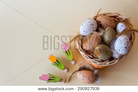 Easter Little Eggs With Feathers In Basket, Flowers. View From Above With Copy Space. Flat Lay.
