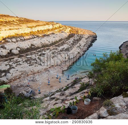 Lampedusa, Italy - July, 29: View Of Cala Greca At Sunset In The Summer Season On July 29, 2018